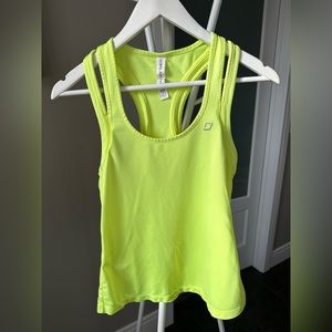 Lorna Jane Fluoro yellow tank. Size S. Back slit detail.